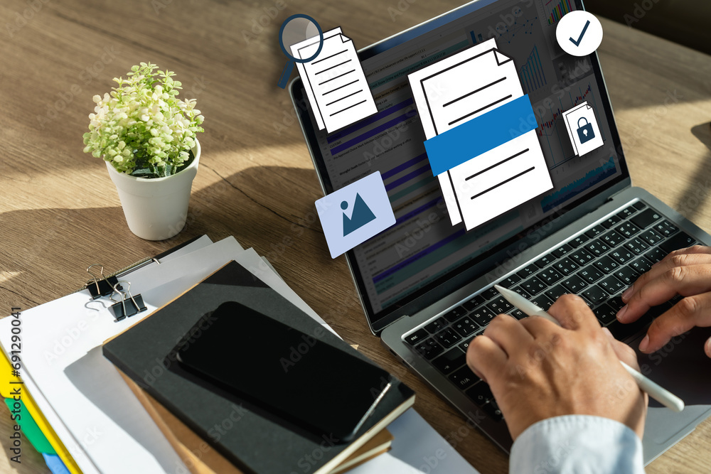 Businessman working with laptop computer document online in doc documents software for online analysis Microsoft Excel project dashboard accounting digital
